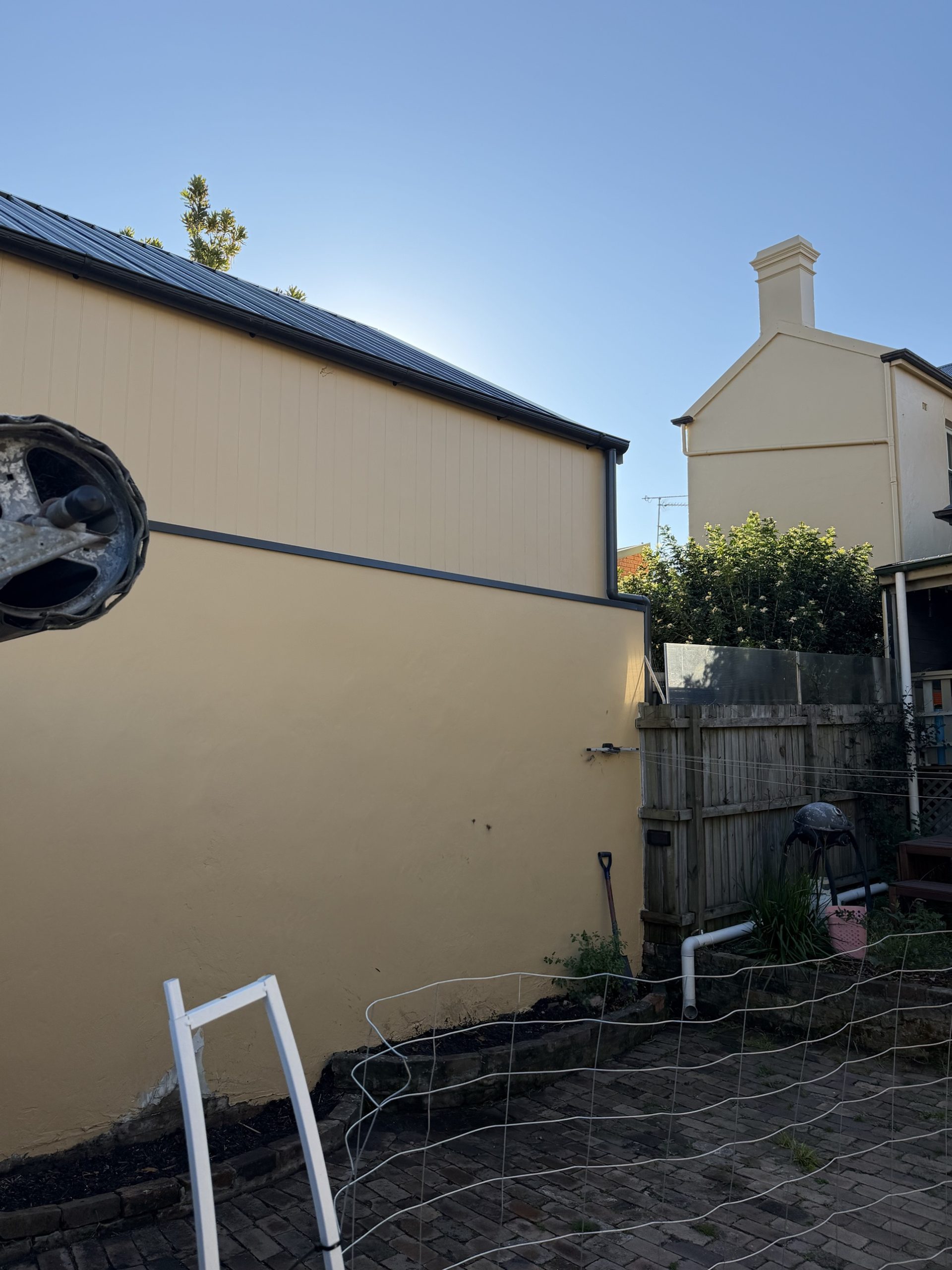 Garden bed cleared of tree and roots, ready for replanting, Newtown